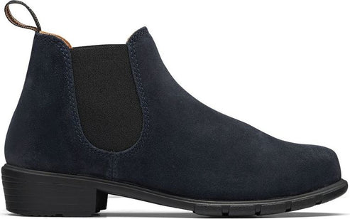 Navy suede Chelsea boot with black elastic side panels and a black block heel and pull loop.