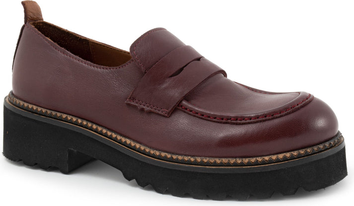 Maroon leather loafer with a black lug sole.