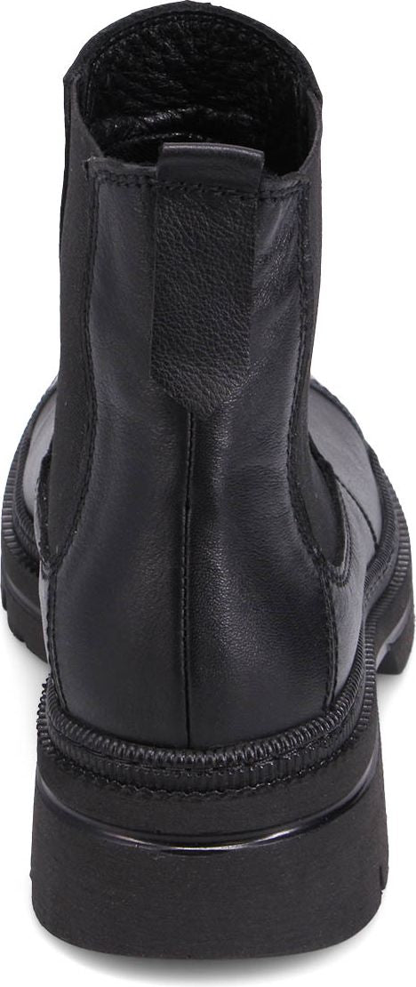 Rear view of a black Chelsea boot with a chunky sole.