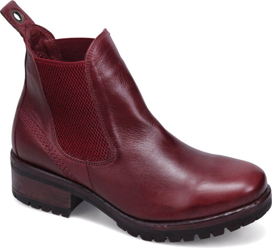 Burgundy ankle boot with lug sole, block heel, side elastic gore, and pull tab