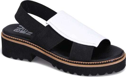 Black and white platform sandal with elastic heel strap and textured sole.