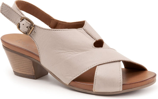 Light beige leather sandal with a 2 inch block heel and an adjustable strap.