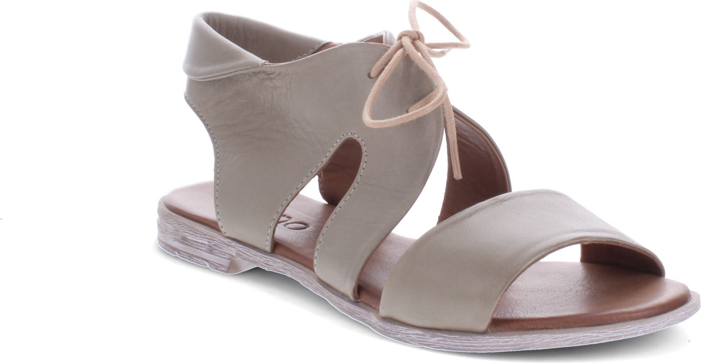 A light brown sandal with a wrap-around tie at the ankle and open toe.