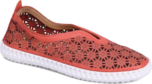 Perforated coral slip-on shoe with white sole.