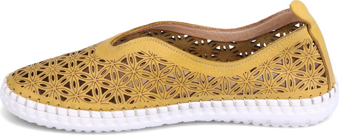 A yellow slip-on shoe with laser-cut floral pattern and white sole.