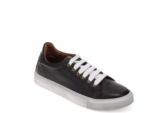 Black leather sneaker with white laces and white sole.