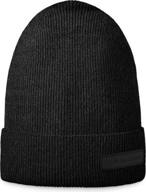 Black knit beanie hat with a folded brim.