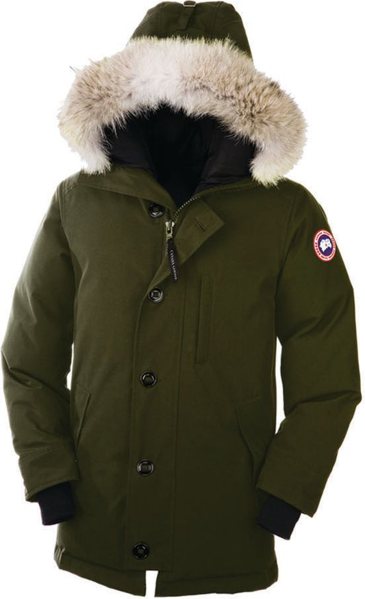 Olive green winter coat with fur trim hood, button and zipper closure, and brand patch on sleeve.