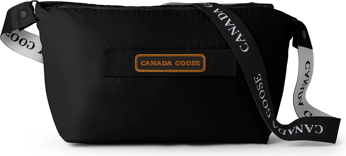 Black bag with CANADA GOOSE straps.