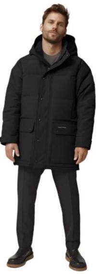 A man in a black coat and pants.