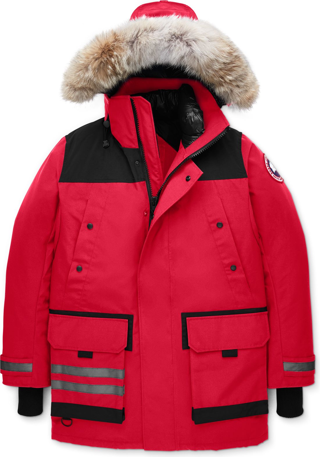 Red winter coat with fur-trimmed hood, black shoulder panels, and four front pockets.
