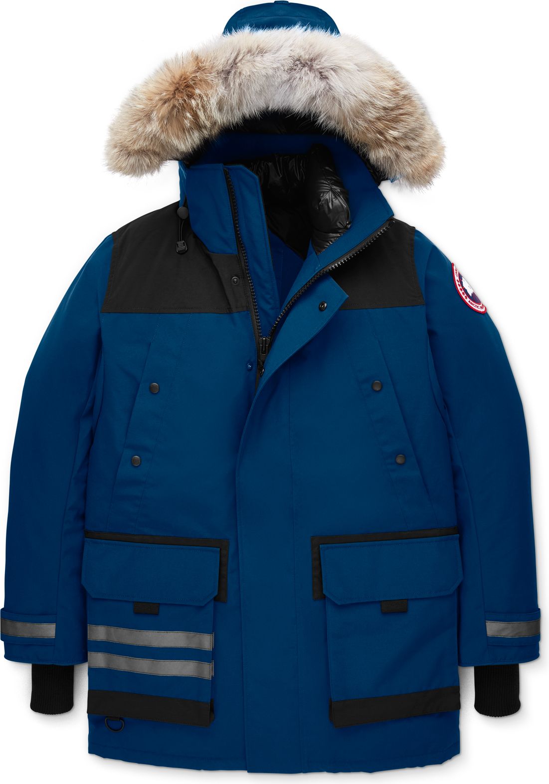 Blue parka with fur-trimmed hood, black yoke, patch pockets and reflective stripes on the cuffs.