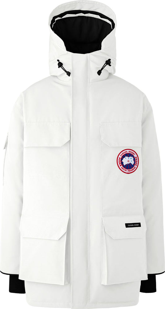 White winter parka with four front pockets, a hood with black lining, and an arm logo.