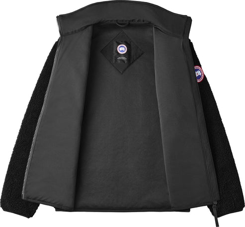 Open black fleece jacket revealing a smooth interior and logo patch on the inside neck.