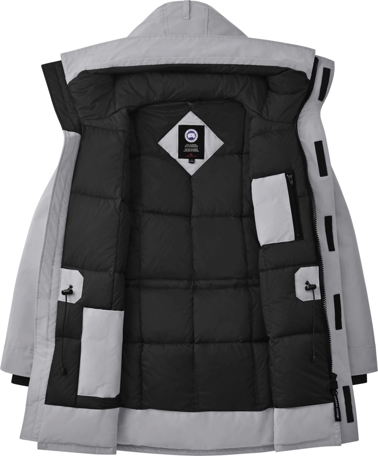An open light gray parka with black insulated interior, several white pockets and drawstrings.