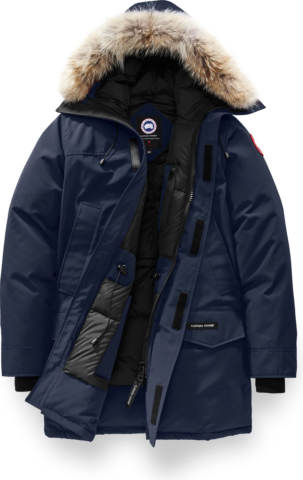 Open navy blue parka with fur-trimmed hood, and black trim.