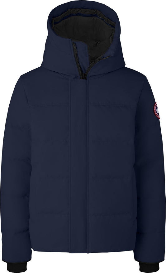 Navy hooded puffer jacket with visible circular badge on the upper arm.