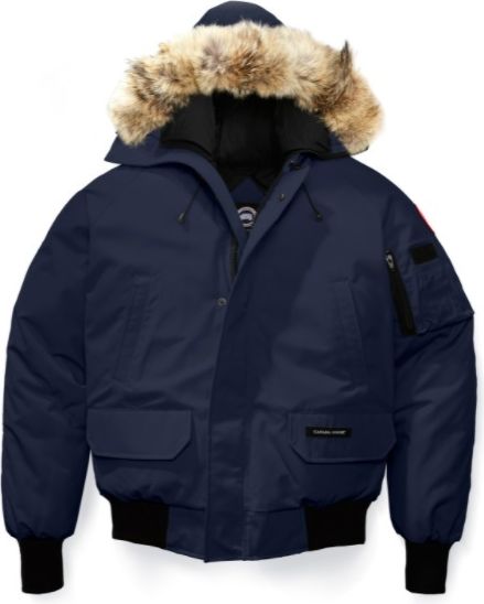 Navy blue, bomber-style winter coat with fur-lined hood and black cuffs.