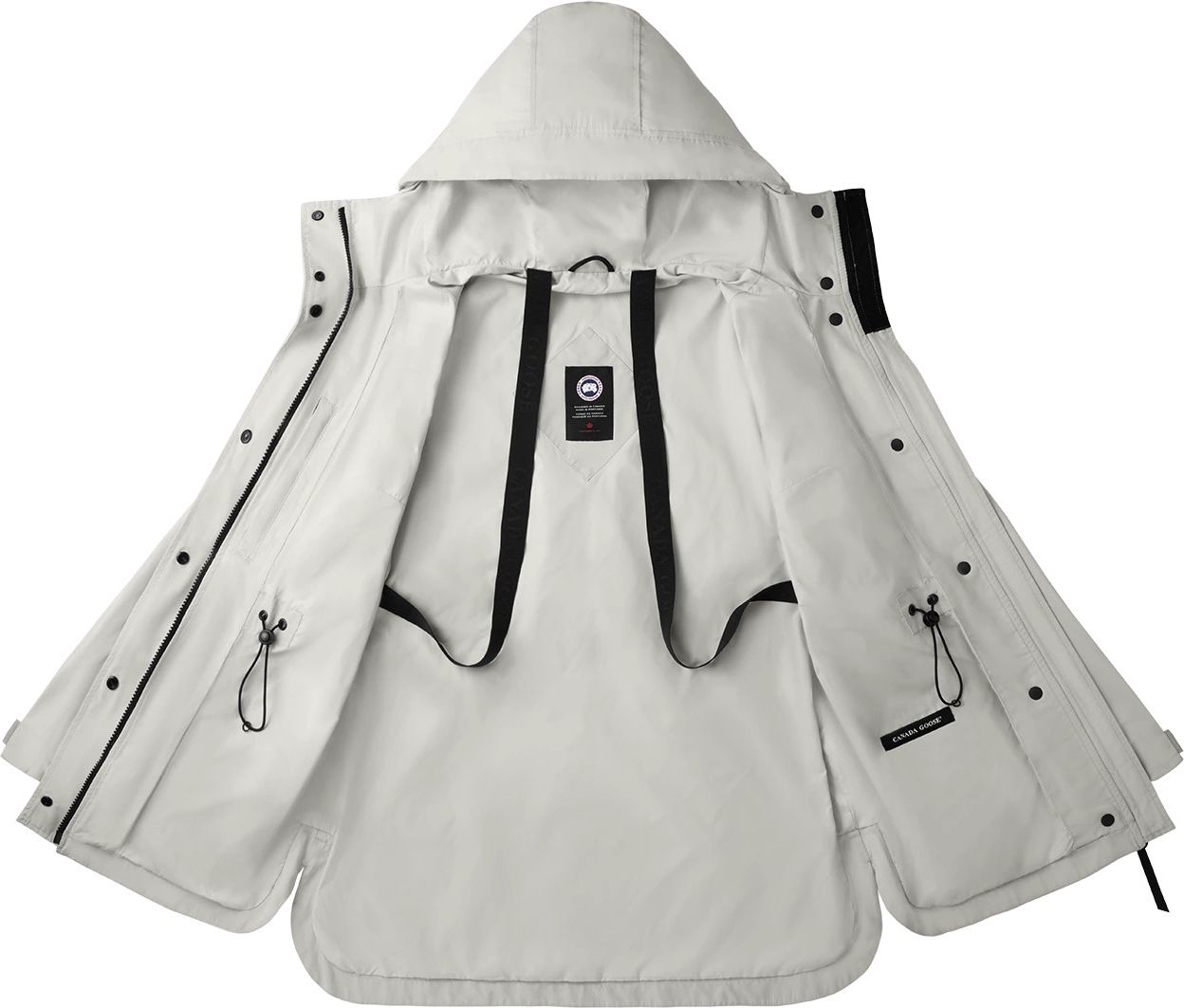 Open hooded white jacket with black straps.