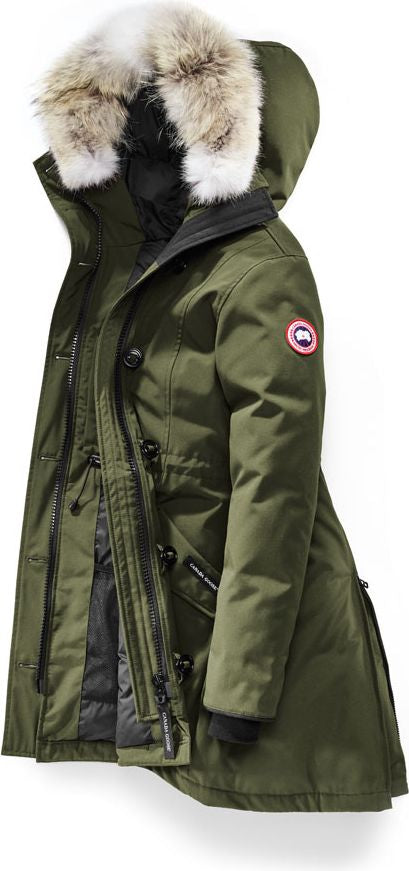 Olive green parka with fur-trimmed hood and the red, white and blue Canada Goose logo on the right arm.