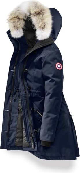 Navy blue parka with fur hood.