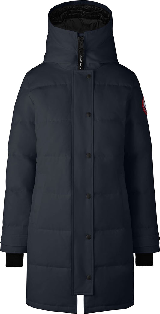 Navy down-filled, long coat with hood, buttoned closure, and Canada Goose logo.