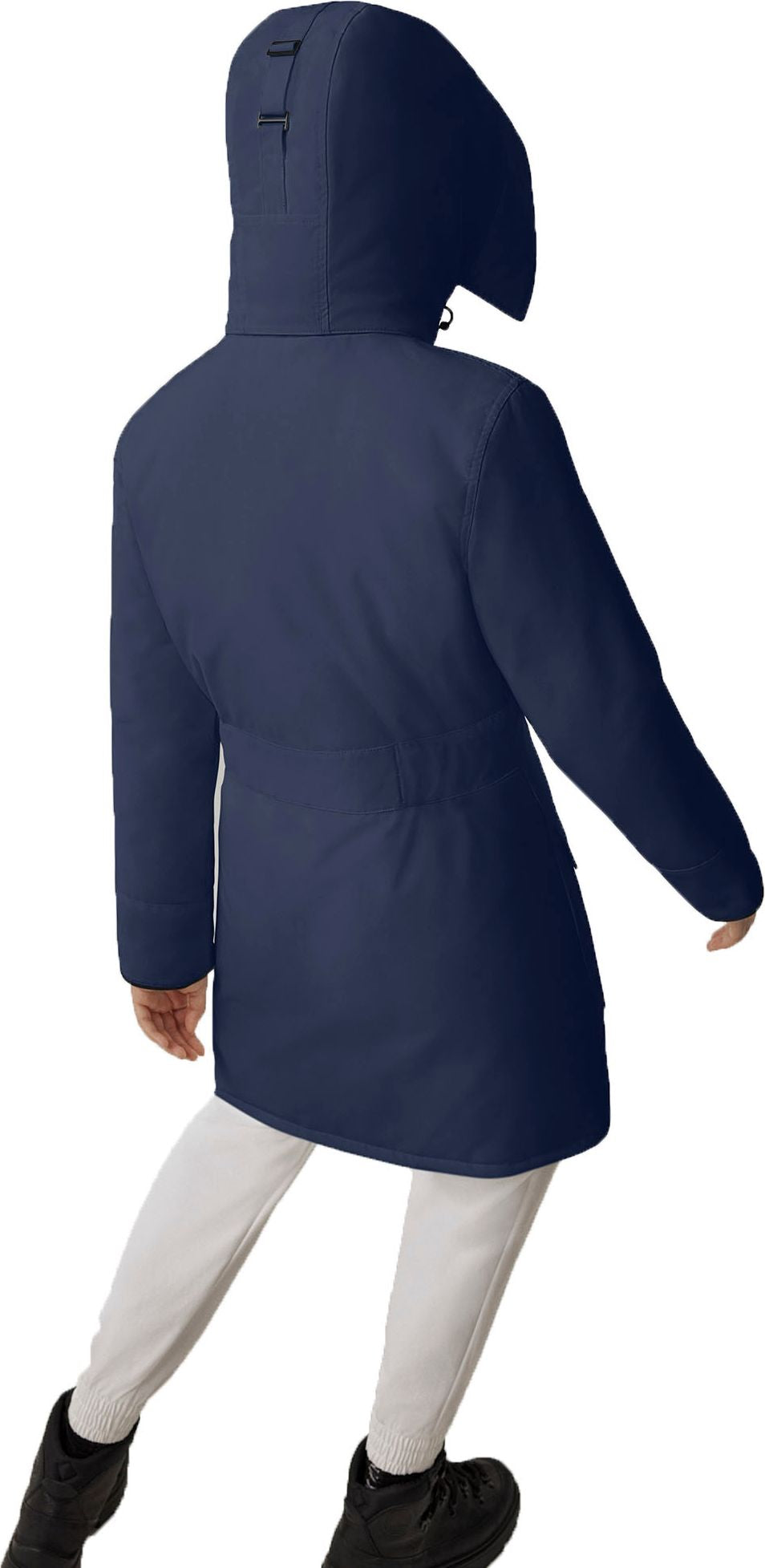A person wearing a navy jacket, white pants and black shoes is seen from behind.