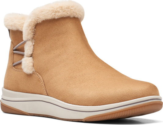 Tan ankle boot with faux fur trim and decorative side laces.