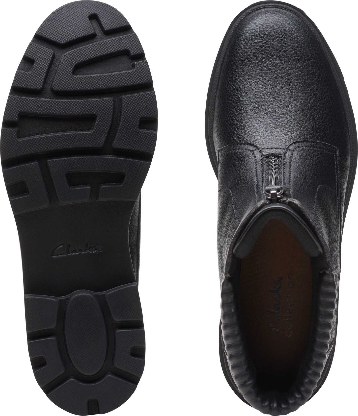 Black leather ankle boot with a zipper and lug sole.
