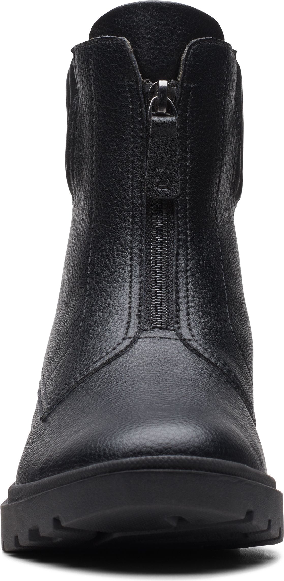 A close-up of a black, zip-up boot.