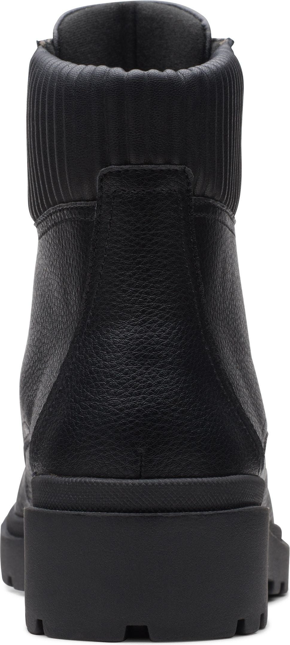 Rear view of a black boot with a knit collar and block heel.