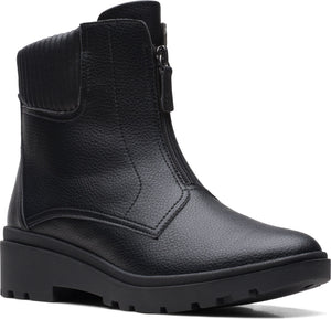 Black ankle boot with front zipper and textured collar.