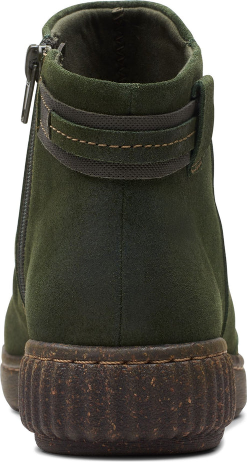 Rear view of a green ankle boot with a zipper closure, decorative strap, and a ridged sole.