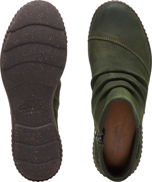 Olive green ankle boot with side zipper, and a brown sole.