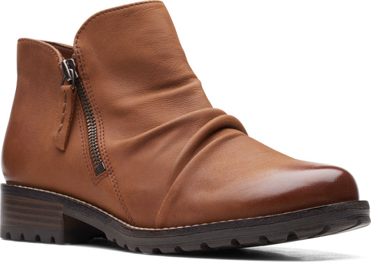 Brown leather ankle boot with zipper.