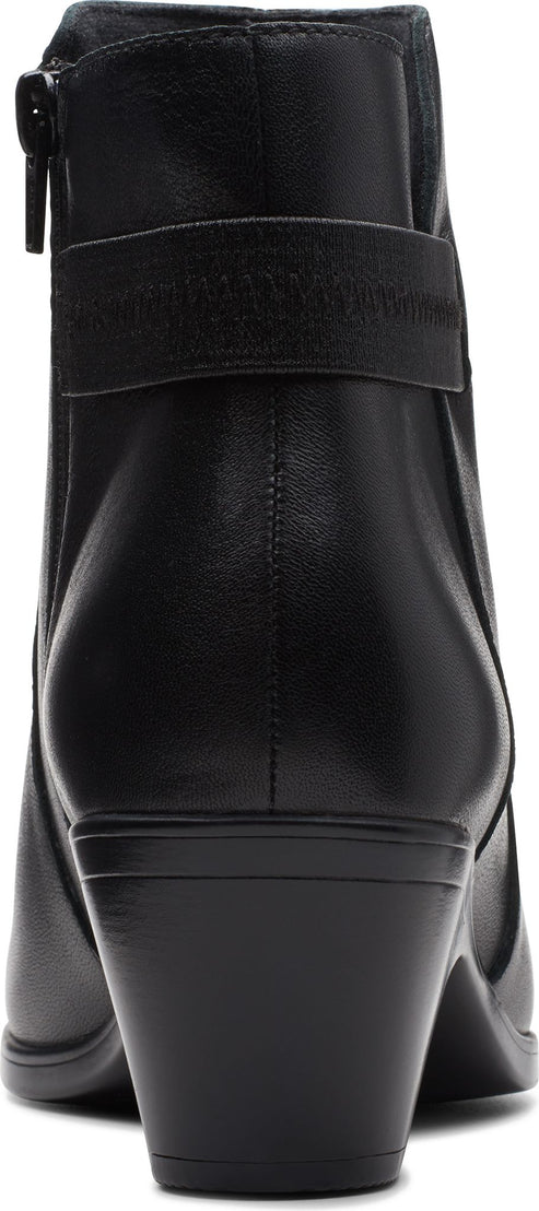 Rear view of a black ankle boot with a zipper and strap.