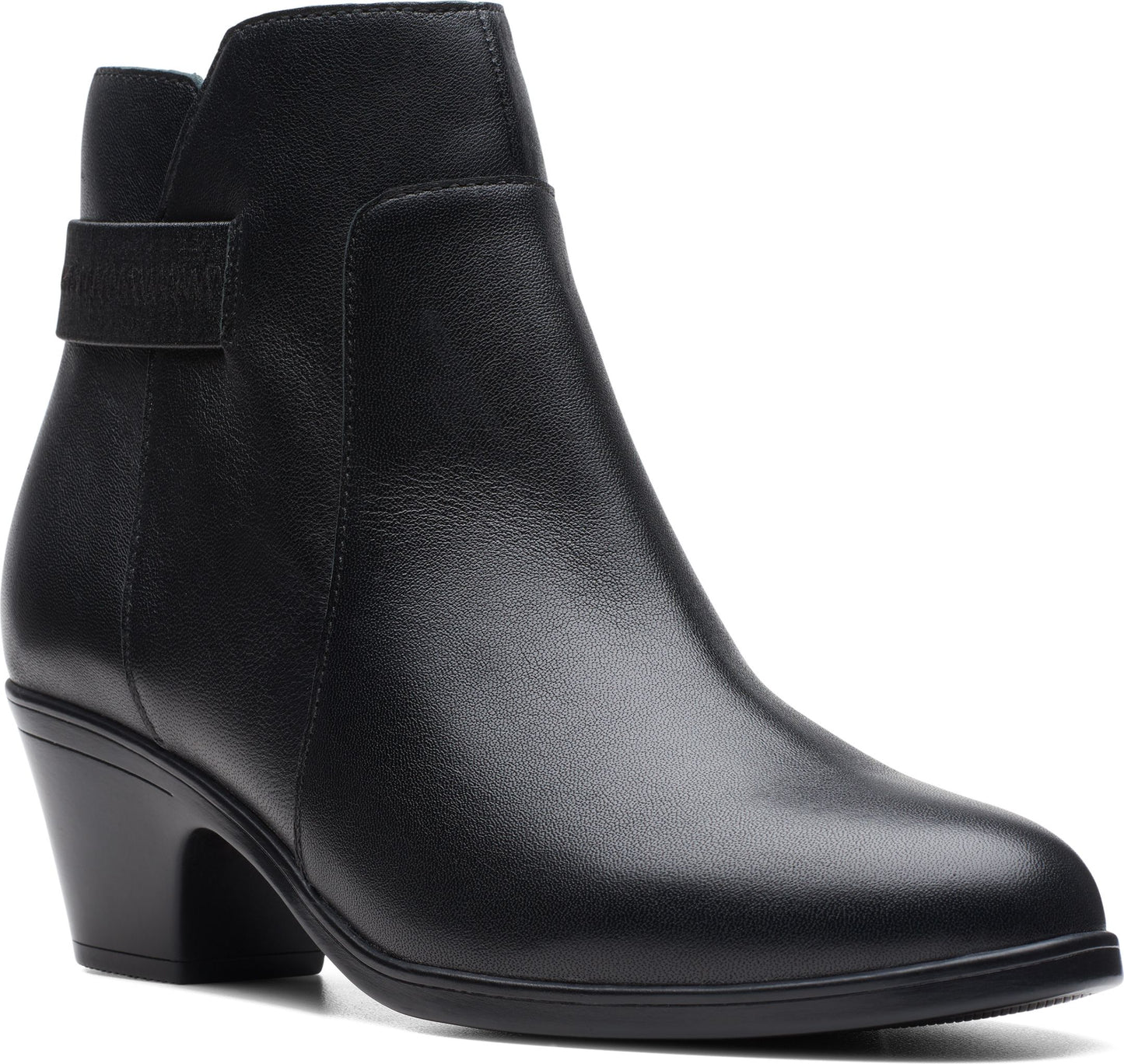 A black leather ankle boot with a low block heel and a decorative strap around the ankle.