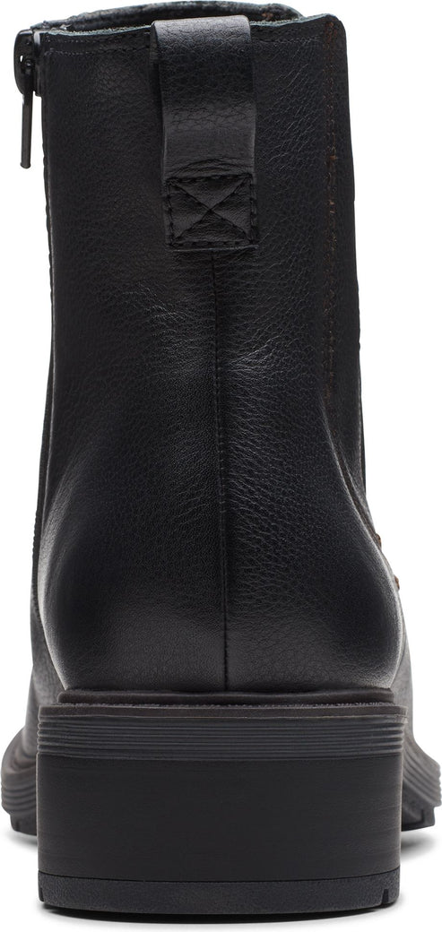 Back view of a black leather ankle boot with a chunky heel and a zipper on the side.
