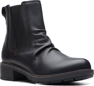 A black leather ankle boot with elastic goring and a stacked heel.