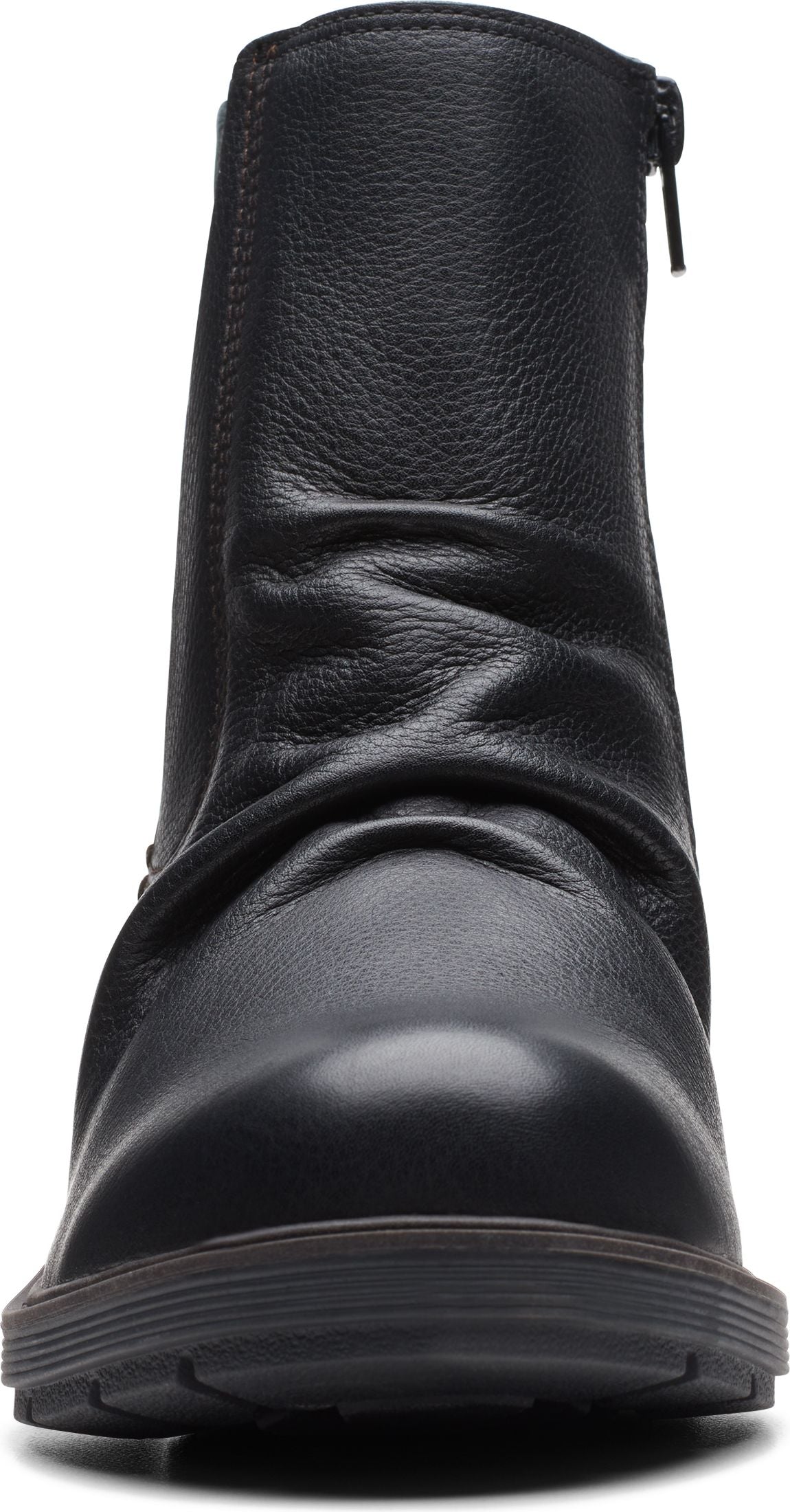 Close-up of a black ankle boot with a side zipper.