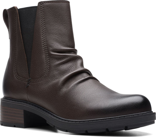 Brown leather ankle boot with elastic side panels and low stacked heel.