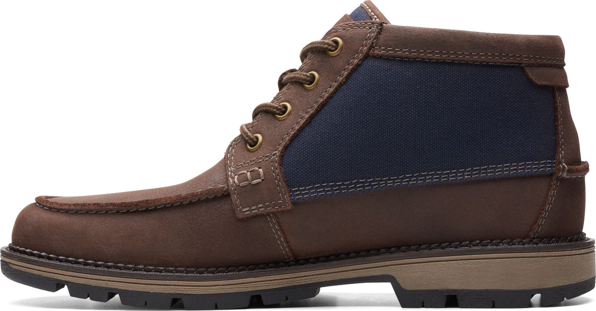 Brown leather ankle boot with blue canvas and a moc toe.
