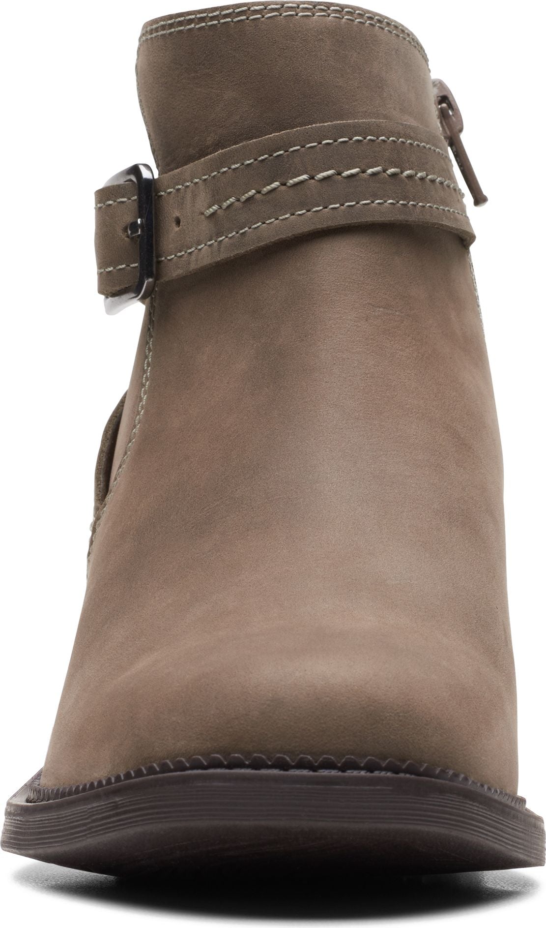 Front view of a taupe ankle boot with a buckle strap.