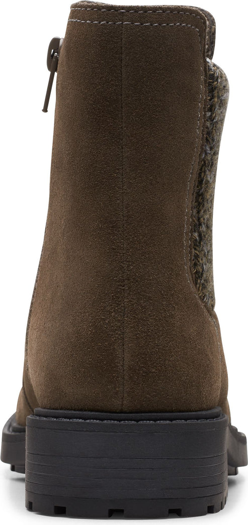 A back view of a brown ankle boot with a side zipper and a textured panel on the heel.