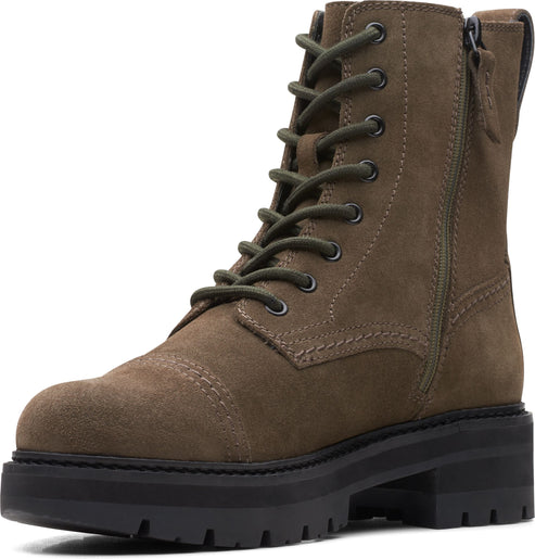 Olive-green suede combat boot with lace-up front, side zip, and thick black lug sole.