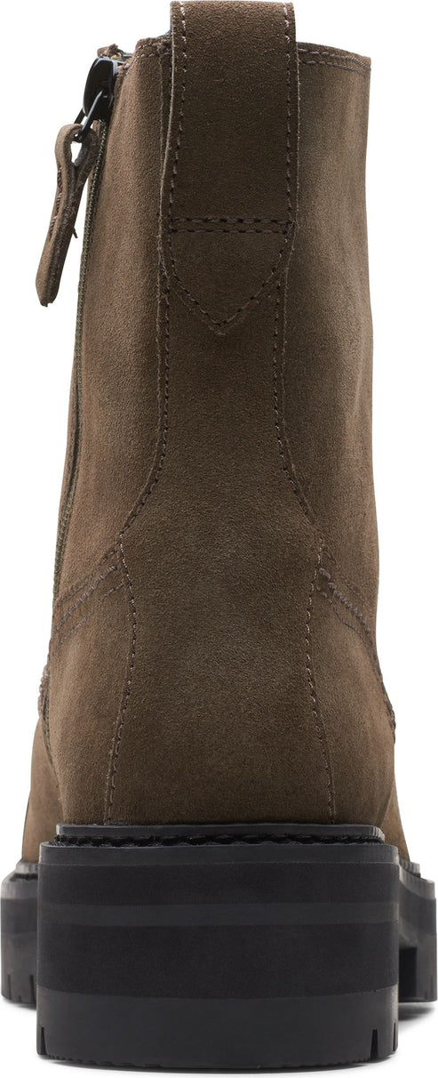 A lug-soled suede ankle boot with a side zipper.