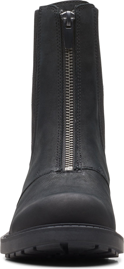A black boot with a zipper closure.