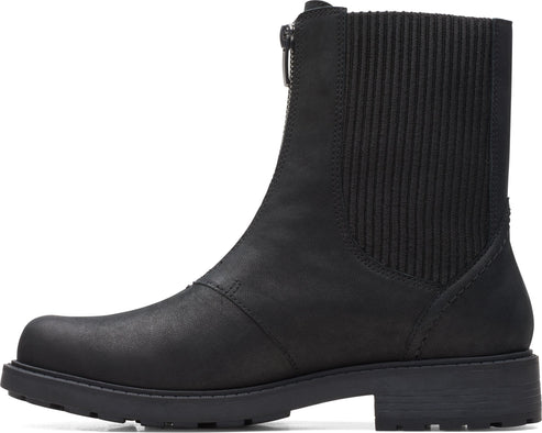 Black ankle boot with center zipper and a ribbed detail.