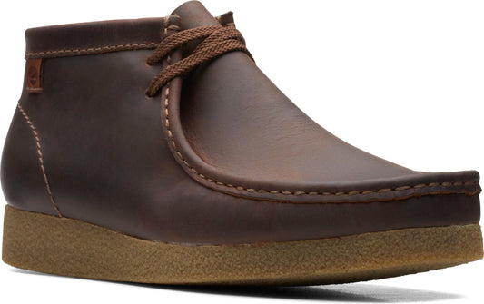 A brown ankle-height leather boot with a crepe sole and lace-up closure.
