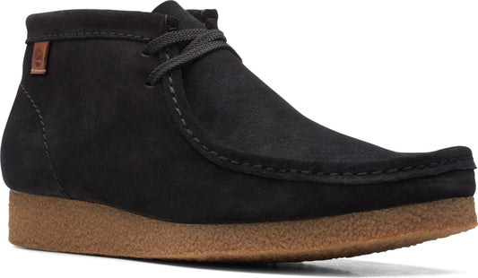 Low profile black suede boot with a crepe sole and lace-up closure.
